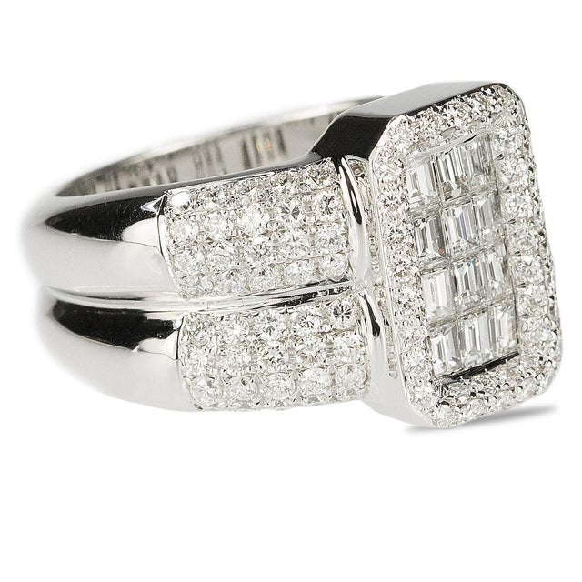 Oliva 18kt white gold double band diamond ring with 1,90 carats of round and baguette diamonds 10.12 grams size 6.75