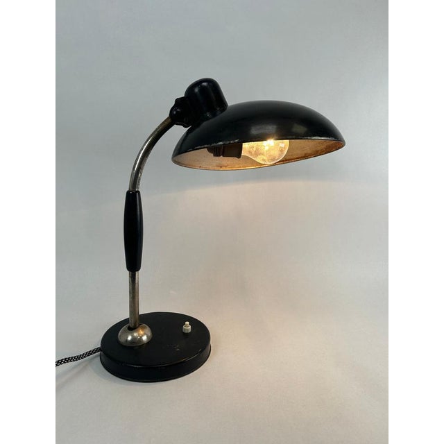 Mid-century design desk lamp by Christian Dell for Escolux Germany in original vintage condition with signs of use. This...