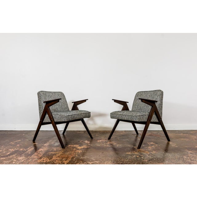 Pair of restored “Bunny” armchairs, model 300-177, produced by the Dolnośląska Fabryka Mebli, Poland, 1970s. The set has...