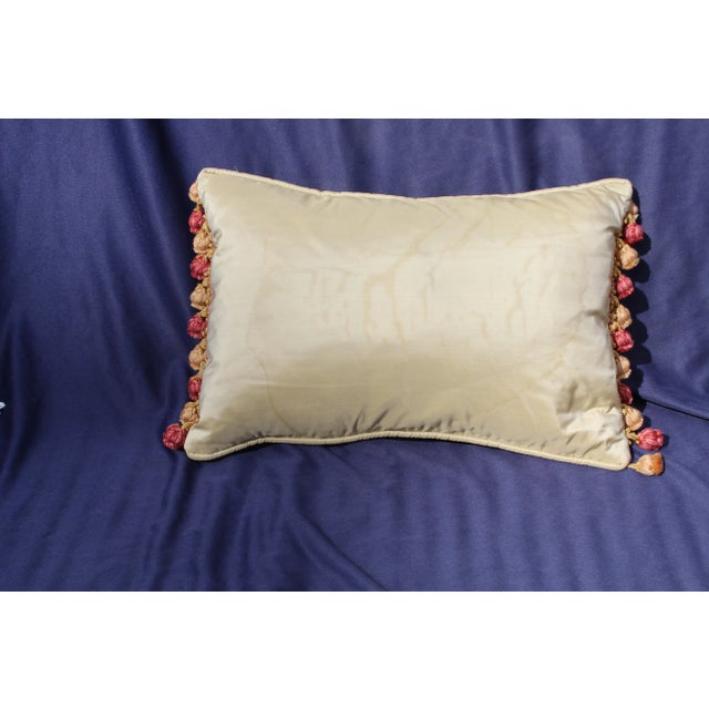 This is an antique 19th century French Aubusson silk pillow.