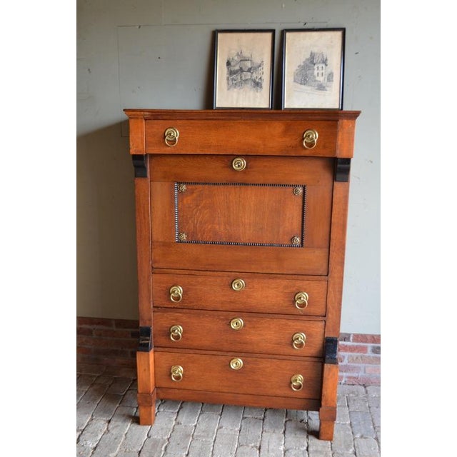 19th-century Dutch oak secretaire, desk, bureau. The height is 148 cm. The width is 96 cm. The depth is 50 cm. A drawer at...