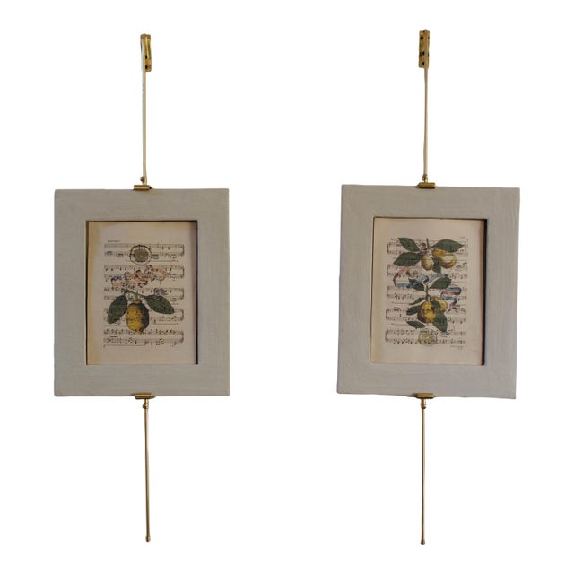 The Annette is a wood frame covered in papier mache and finished in a limewash paint, housing a Giclee reproduction from...
