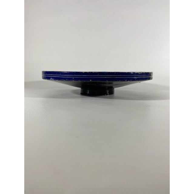 Round papier mache bowl with lacquered relief decoration and hand painted flowers and birds.