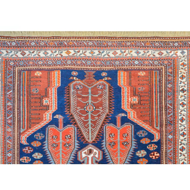 A fantastic early 20th century Shkli rug from the Karabagh area in the Caucasus with a bold tribal pattern with a large...