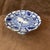 Two blue-and-white porcelain dish on a pedestal, shaped like a petal and decorated on the inside with blue-and-white...