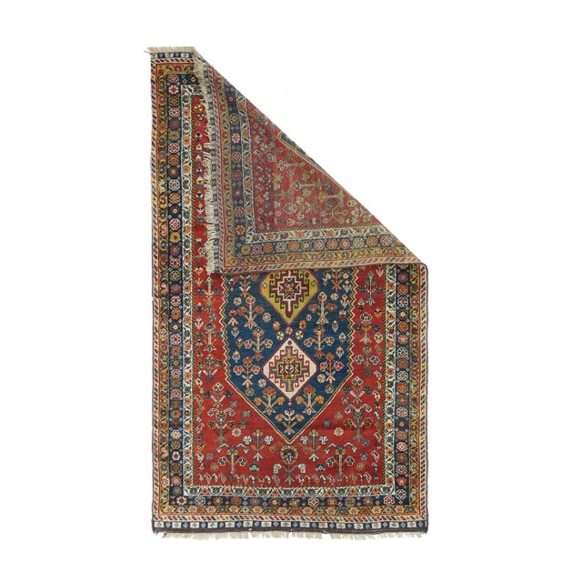 The red, subfield, with unidirectional flowers, hosts a hexagonal navy subfield centred by three stretched hexagonal...