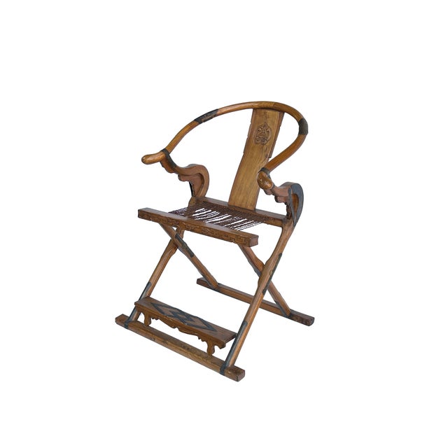 Crafted with the timeless elegance of traditional Chinese craftsmanship, this antique-style folding horseshoe-back...