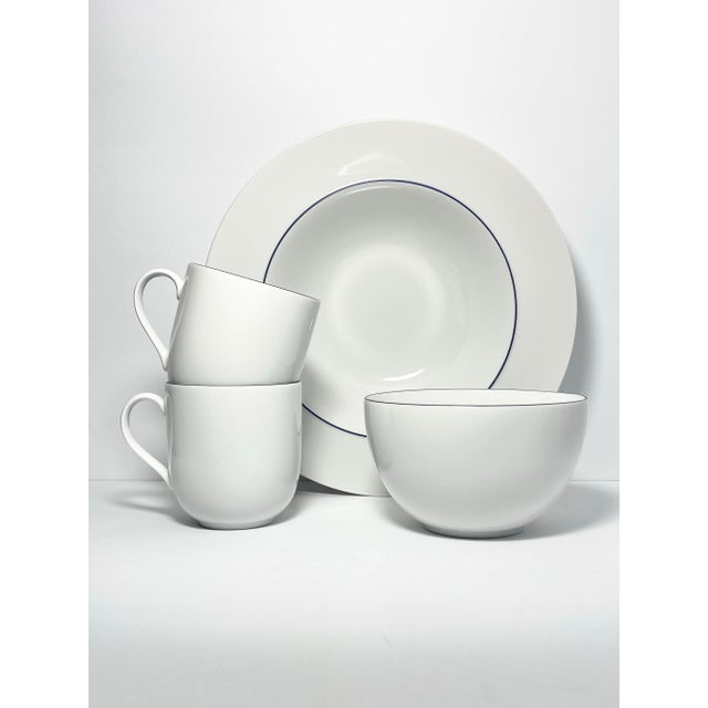 Crate and Barrel “Epoch Blue Line” 4-Piece Ceramic Dinnerware Serving Set Good condition. No chips, cracks, or fleabites....