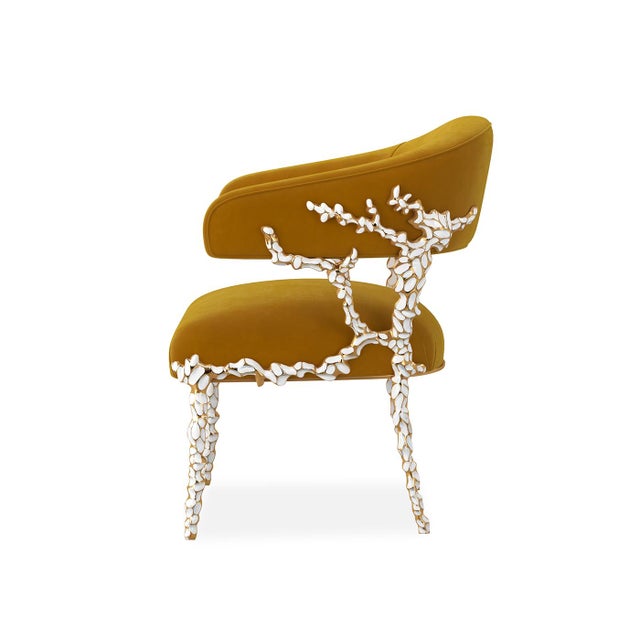Inspired by the organic elegance of nature, its sculptural frame evokes the fluidity of branches or coral reaching for the...