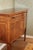 A serpentine-front sideboard in the Hepplewhite manner, circa 1919, at a compact and genuinely usable scale. A single long...