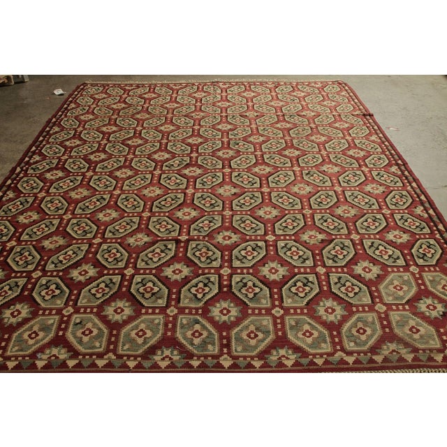 Handwoven in wool, a vintage Bessarabian kilim rug from Turkey circa 1950-1960—now entering our flatweave collection. The...