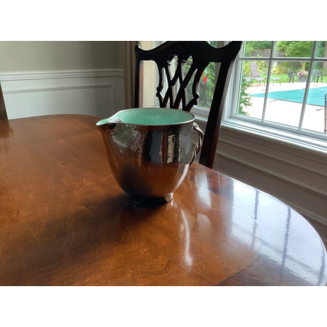 Add a punch to your bar with this beauty. This pottery glazed pitcher is functional and a conversation starter. ( i think...