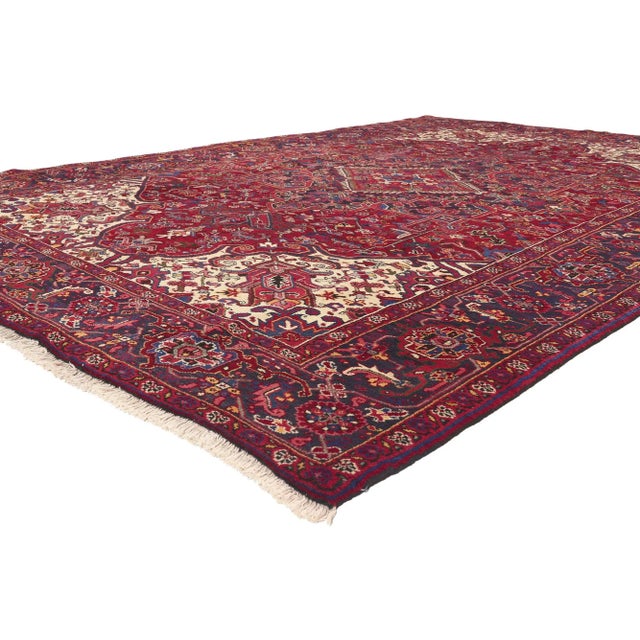 76163 Vintage Persian Heriz Rug, 07'10 x 11'04. Classic elegance meets effortlessly chic in this hand knotted wool vintage...