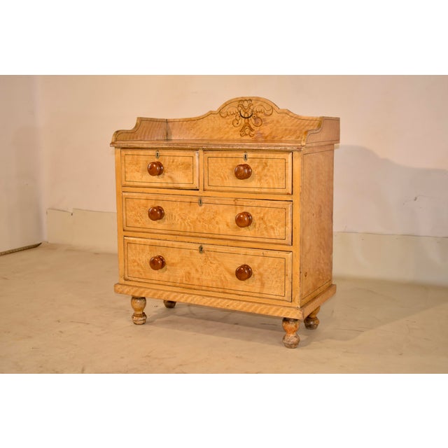 19th century faux painted chest of drawers from England. This is a lovely hand decorated and beautifully proportioned...