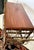 Offering a vintage brass and wood slab fancy trolley cart with wine storage. Wood top is pristine and wheels roll well.