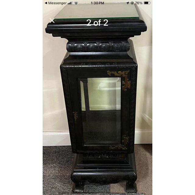 ebonized wood, greek key filigree, beveled glass cabinet and specialty cut glass top. this was originally purchased in NYC...