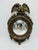 This is a small vintage Federal-style convex mirror with bold decorative details. Design & Features: • Mirror: A round...