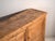 Antique wooden sideboard with three doors (c.1920) Approximate age: 100 years Material: Pine Our wooden sideboard is a...