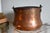 Antique copper coal or log bucket with iron handle, and dovetail joints. Condition is good commensurate with age. Measures...