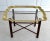 Here is a beautiful side tray table that has a brass and glass top on a metal base. The tray top is made with a thick,...