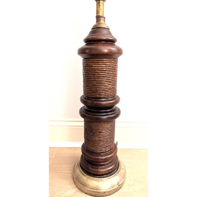 This unique turned wood lamp (believed to be walnut) has a lovely rush accent "rope" around the column in two sections. It...
