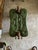 Add a touch of global eclectic charm to your space with this vintage Mid-Century camel saddle footstool. Featuring a...