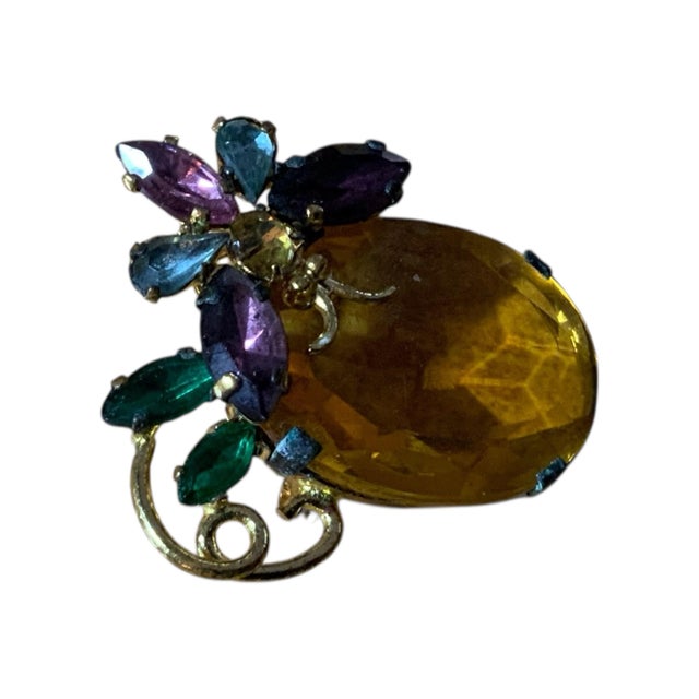 Vintage from the 1950's We are offering a Small butterfly on pink stone. Prong stone setting