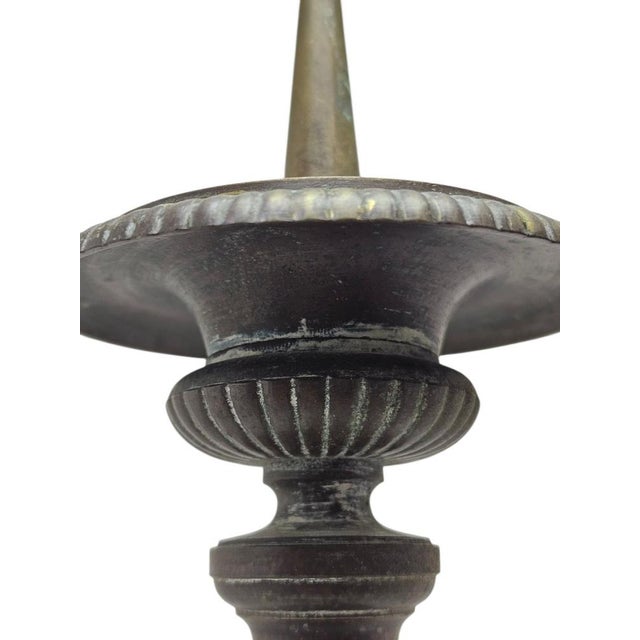 Pair of 19th-century Baroque style baluster brass altar candlesticks. A rare collector's item with traces of original...