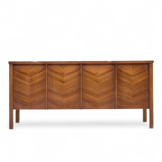 Kent Coffey Perspecta Mid Century Walnut Buffet Credenza This credenza measures: 56.25 wide x 17.5 deep x 26.25 inches...