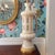 Listing is for a highly carved alabaster table lamp with cut out openings akin to a lantern. 54” to base of finial screw...