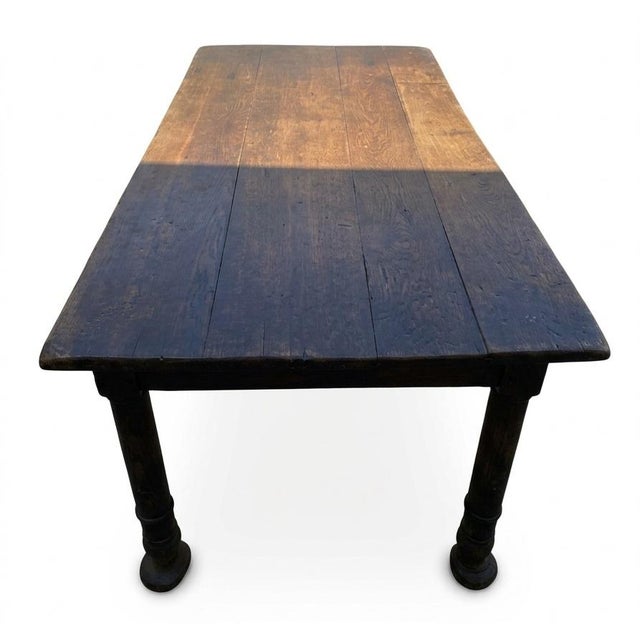 The surface exhibits a highly distressed, deep honey-brown patina, showcasing decades of natural wear, surface character...