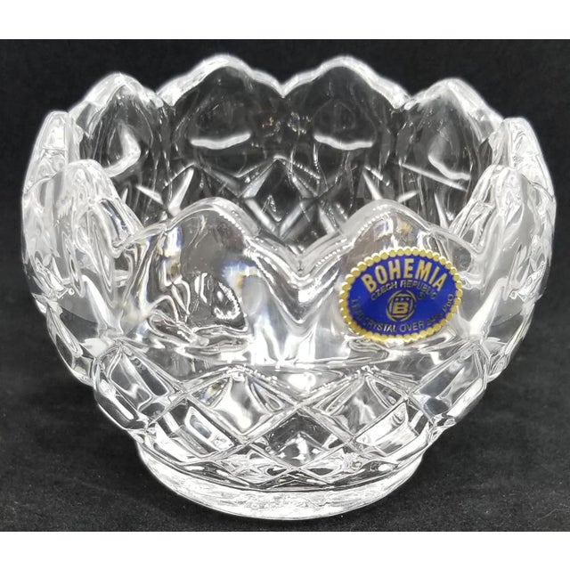 We love this extraordinary small lead glass decorative bowl for the weight, glistening appearance and original tag that...