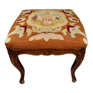 Antique French Louis XV Style Carved Wood Figural Needlepoint Footstool For Sale
