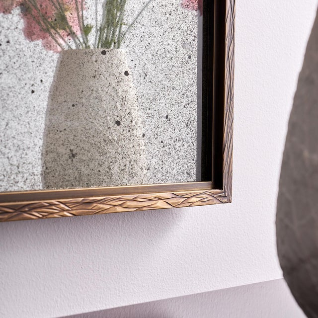 The Lineage Brass Mirror begins with solid brass, shaped and hand-scored by artisans to create a signature linear texture....