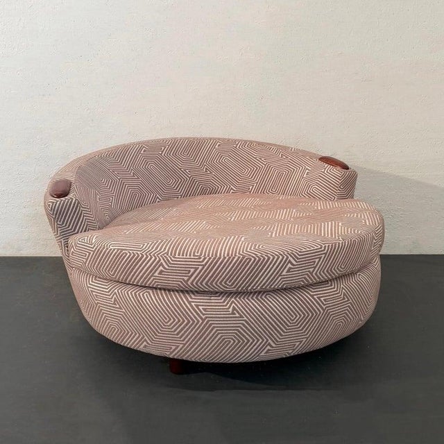 This oversized, mid-century modern, round chaise lounge chair follows the form and feel of the "Havana" chair by Adrian...