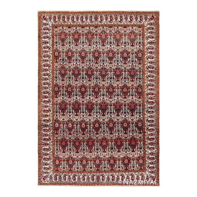 Nazmiyal Collection Fine Antique Persian Vase and Paisley Design Farahan Rug For Sale