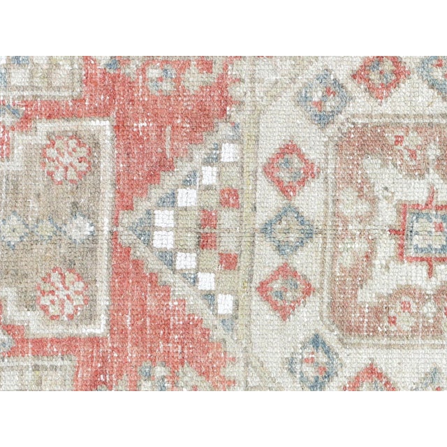 This beautiful vintage Turkish Oushak Rug is hand-knotted with 100% wool on a wool foundation to provide a soft, warm...
