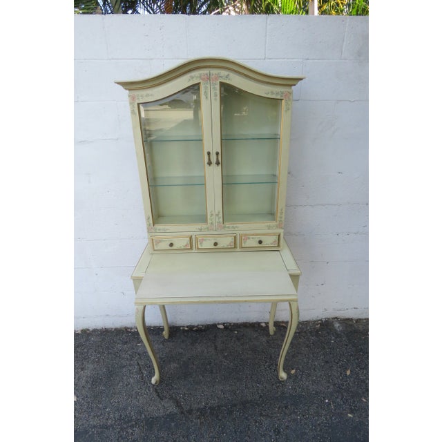 This beautiful Secretary Desk is made out of wood, solid wood, solid mahogany, glass, and metal. It has a French style and...