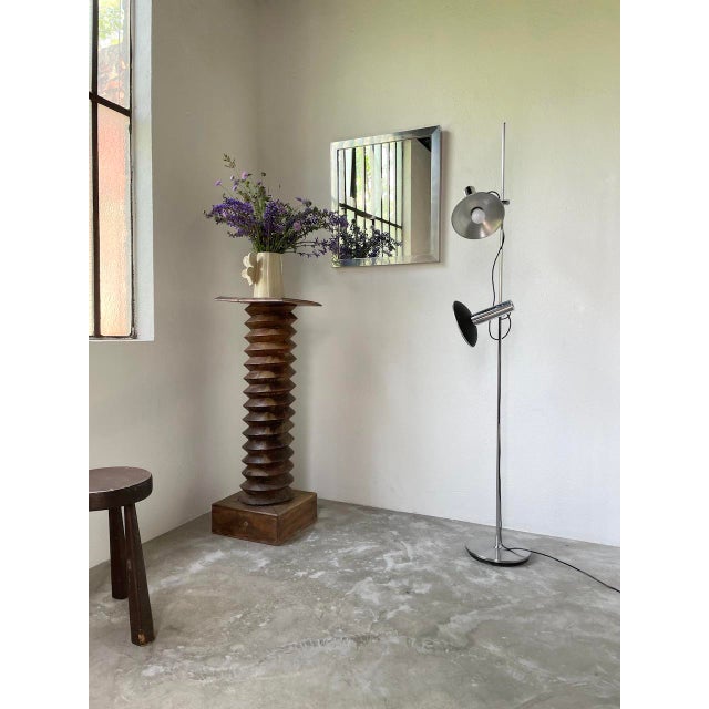 Old chrome floor lamp and black granulated metal reflector by designer Alain Richard for Diderot editions, published in...