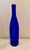 Set of three long neck vintage bottles in light aqua, cobalt blue and dark green. Slender and elegant, these will add...