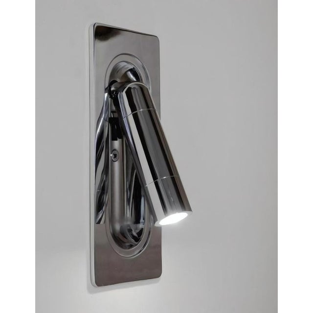 Handled led wall light by aggiolight. Dimensions: w 7 x d 5 x h 17 cm. Materials: precision-machined metal structure in...
