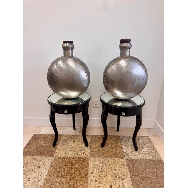 Large decorative pair of vintage Indian water vessels from a Jacksonville estate. Each vessel has a wonderful round...