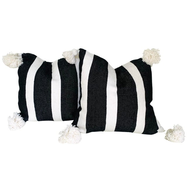 Pair of Moroccan handloomed cotton pom pom pillows with zipper closure New duck feather-and-down fill inserts. Pattern on...