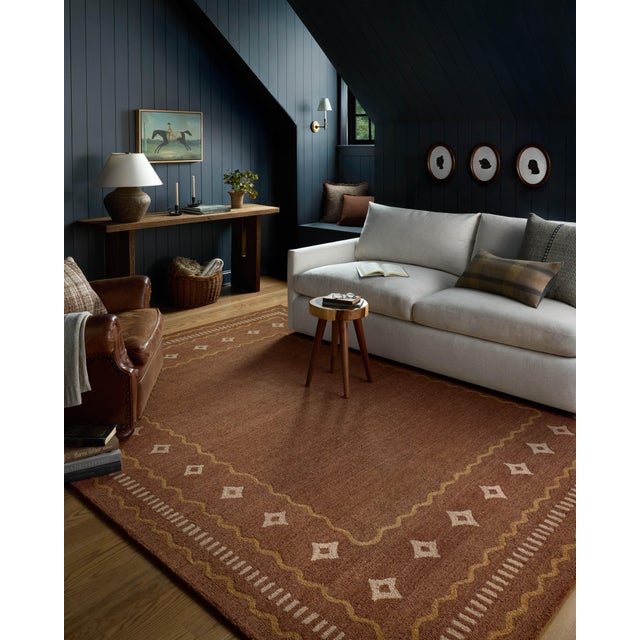 The Alfie Collection from Chris Loves Julia x Loloi is a handmade area rug with a playful framed design, a modern update...