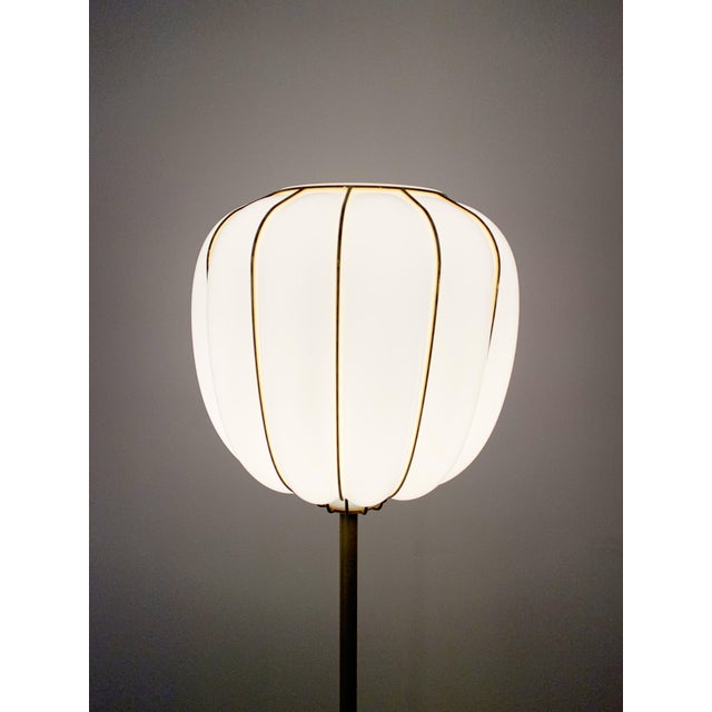 The Casamance collection features glossy white glasses trapped in a brushed brass cage. The diffuser is made using an...