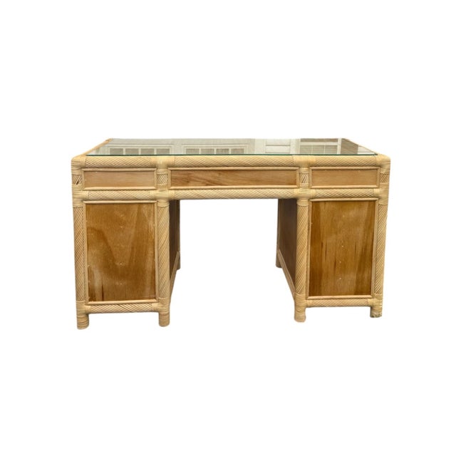 Bring breezy coastal style into your home office with this beautiful vintage rattan desk. Crafted with intricate woven...