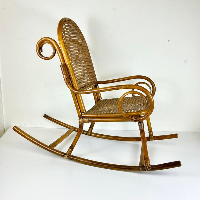 We fell in love with this child-size Bentwood and Cane Rocking Chair. It features a design in the manner of adult-sized...