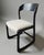 Set of four Baumann sleigh chairs, a timeless classic\. The wood is varnished black, and the seats and webbing have been...