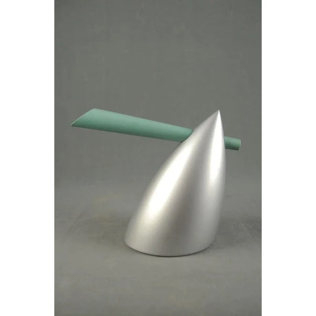 The Hot Bertaa kettle was designed by Philippe Starck for Alessi in 1990. The kettle's body is made of brushed aluminium...