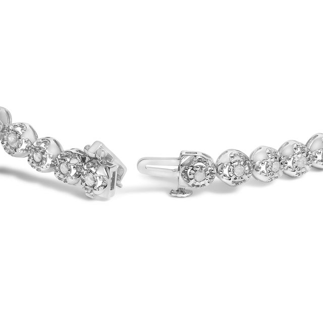Elegant and timeless, this sterling silver link bracelet features 1.0 carat total weight of round, rose cut, promo quality...